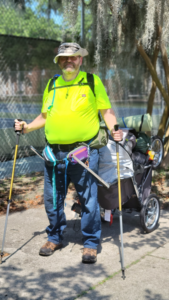 Author, hitched to makeshift walking trailer